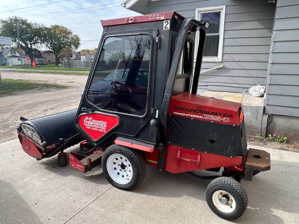 Photo $10,000 Toro 325 Groundsmaster with Broom and Mower Deck $10,000