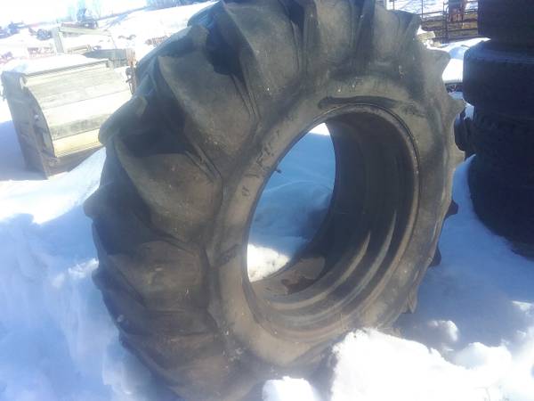 Photo 18.4x30 Tire on drop center Rim $100