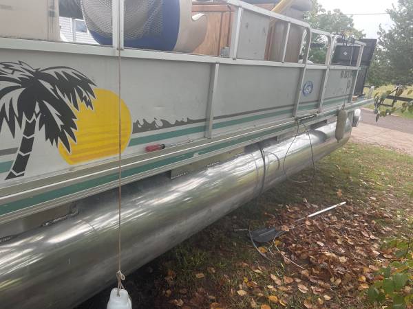 Photo 22 pontoon and trailer $1,600