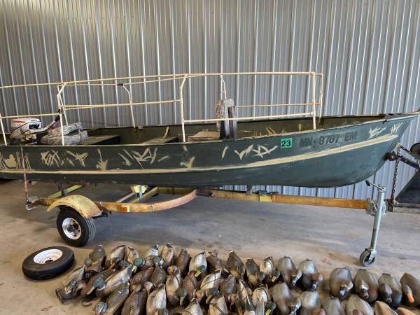 Duck Boat and Trailer $795  9.9 Motor $650