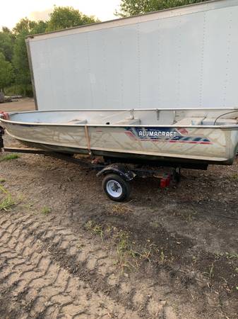 Photo Duck Boat with Motor and Trailer $650