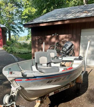 Mercury 4 Stroke, 28 hours, plus Alumicraft boat and extras $3,500