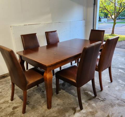 Photo Pottery Barn solid wood table (chairs not included, just showing how many fit) $150