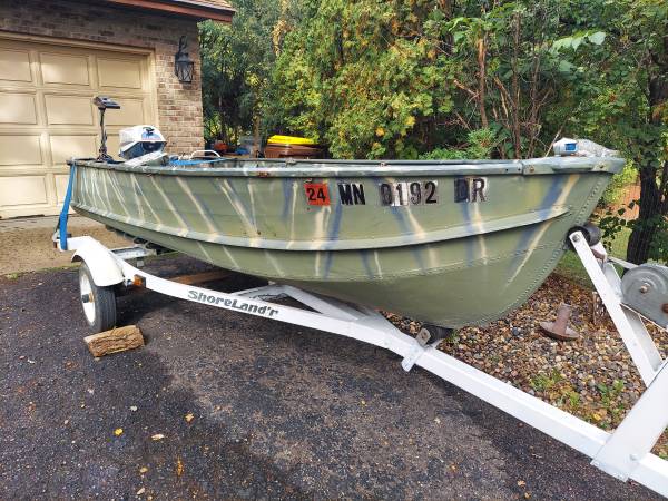 Photo Price reduced 14ft boat and motors $600