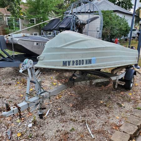 Small boat with trailer $1100