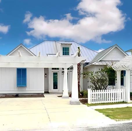 A home with a personal touch - Home in Gulf Shores. 4 Beds, 4 Baths $1,185,000