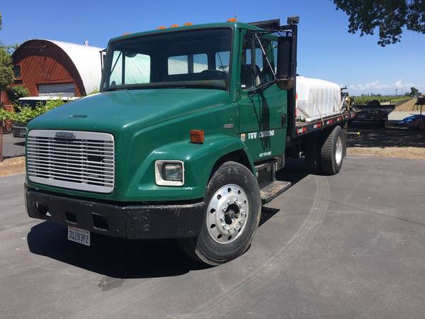 Photo Freightliner FL-70 Flatbed Truck with WaterChemical Handling Tanks $22,500