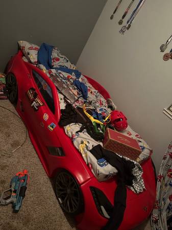 Photo Race car bed with matress $150