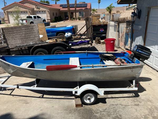 Aluminum row boat 9.8 horse $800