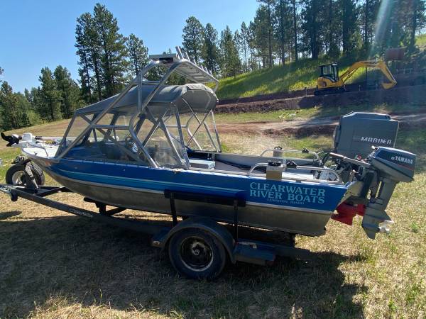 Photo Welded tunnel hull jet  prop boat with full top and solar $18,500