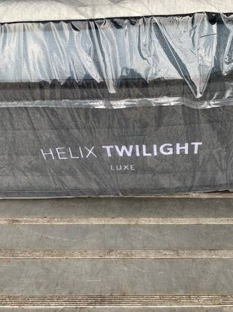 Photo Helix Queen Mattress Like New  $395