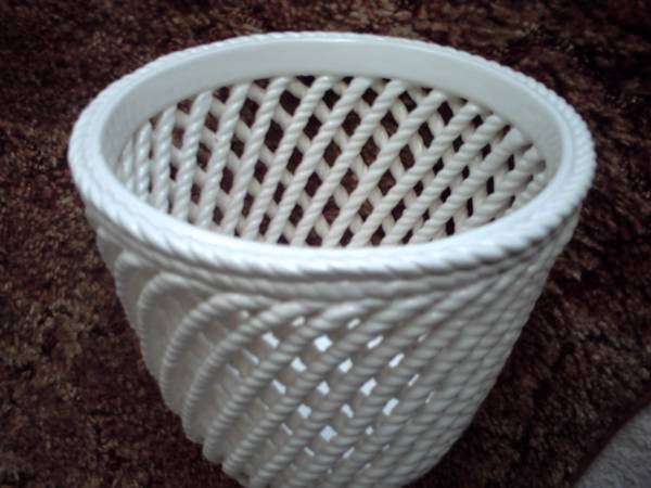 Photo RARE, CERAMIC BASKET WITH OPEN WEAVE. 7in.tall x 9in.wide $20