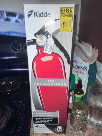Photo NEW fire extinguisher unopened $29