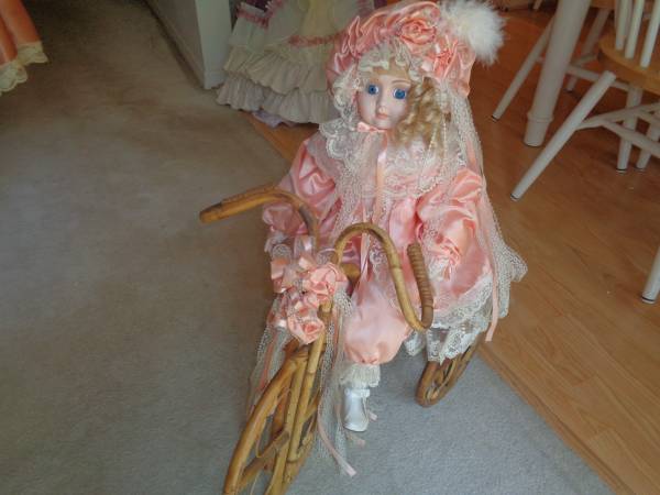 Photo Porcelain Doll on Tricycle $50