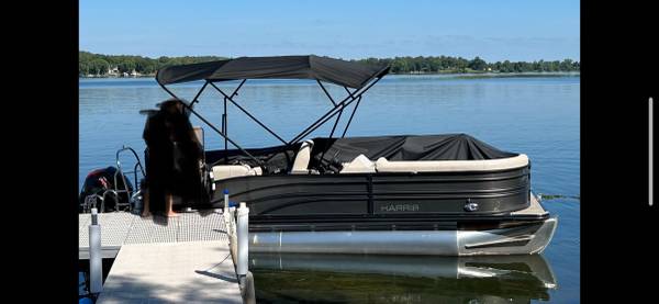 Photo New Black pontoon 1239 x 839 Bimini top with frame and boot - $400 (Lake Park)