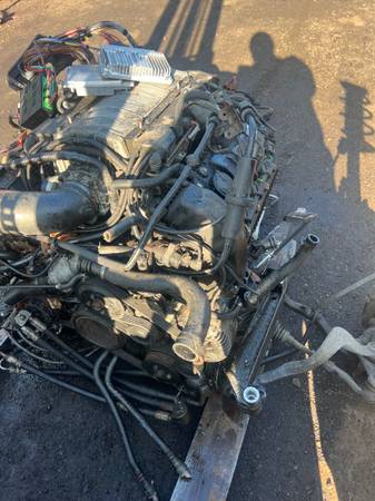 Photo 2004 BMW 745LI AUTOMATIC TRANSMISSION FROM A 4.4 V8 CAR WITH CONVERT $800