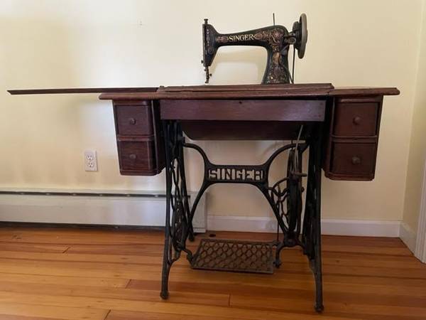 Photo Antique Singer Sewing Machine $150