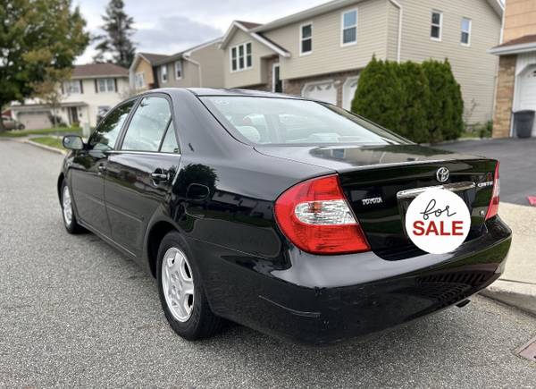 Photo 02 Toyota Camry le v6 gas saver good inspection runs great $2,300