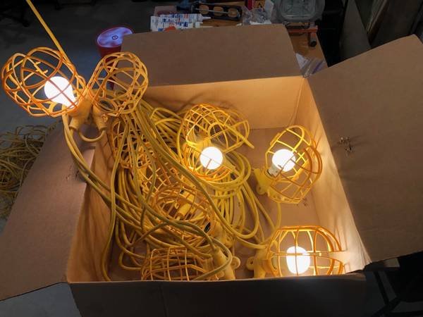 Photo 100 ft. 10-Light Plastic Cage Temporary Light Stringer, Yell $35