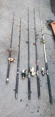Photo (8) Saltwater Fishing Rods (2) Boat Poles  (3) Penn Bait Caster Reels $195