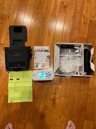 Photo Inogen One G5 Portable Oxygen Concentrator still under th warranty $1,700