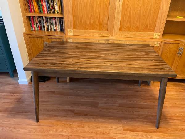 Photo Rock-Solid Wood Table $150