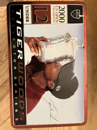 Photo Tiger Woods Collectible tin and balls $40