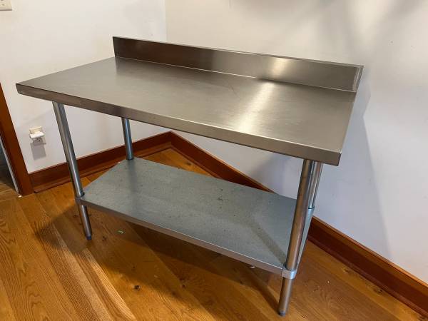 Two Stainless Steel Work Tables $200