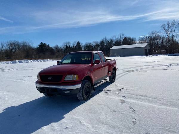 Photo 1997 Ford F150 XLT 4x4 Extended Cab - $4,400 (Grand Blanc)