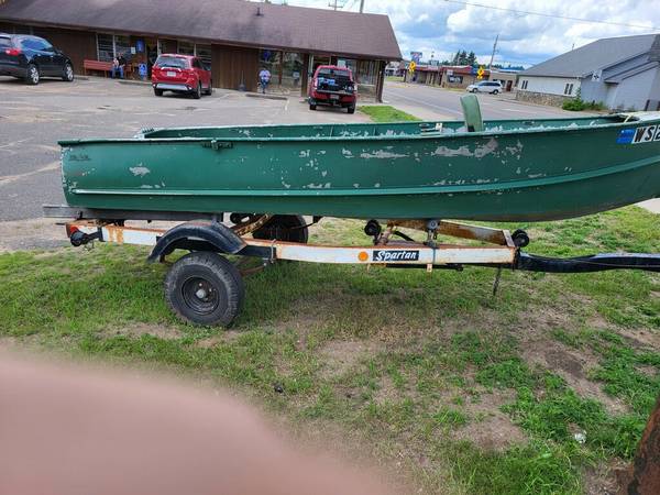 Photo 14 fishing boat and Spartan trailer $350