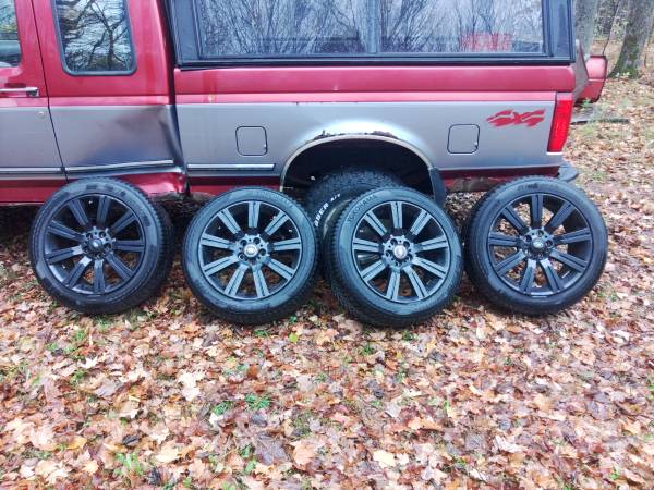 Photo 2754520 Land Rover Range Rover 20 black rims and winter tires $1,600
