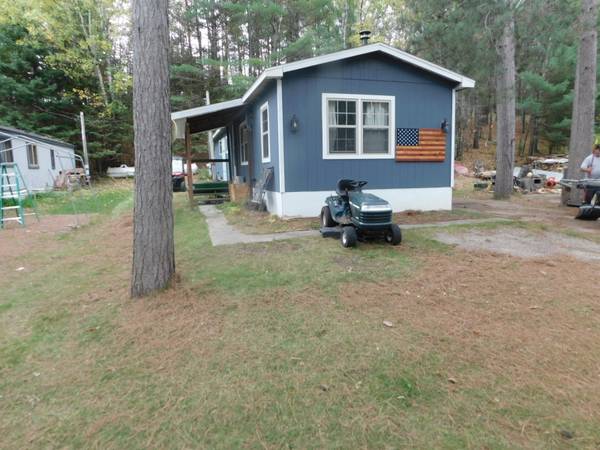 Photo Year Round Mobile Home In Little Rice Resort-C21 Best Way Realty, LLC $65,000