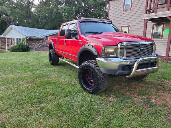 Photo Lifted 99 f250 7.3 powerstroke turbo diesel - $14,000 (Hickory flat)