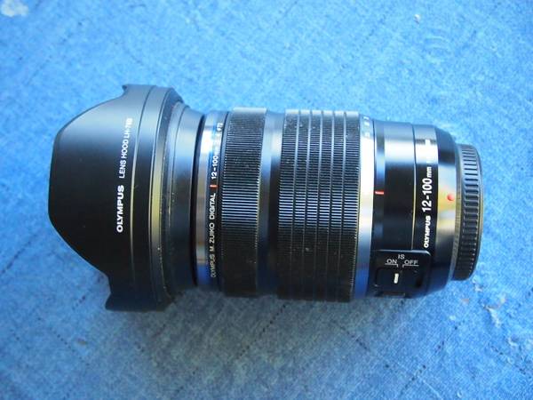 Photo EXCELLENT Olympus 12-100mm f4 PRO lens $800
