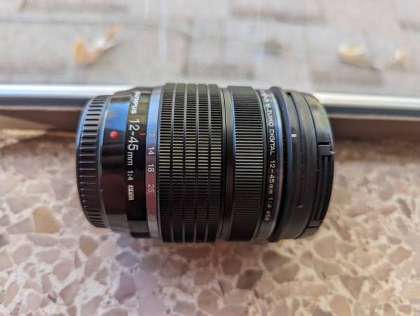 OM System (Olympus) 12-45mm f4 PRO lens - LIKE NEW $390