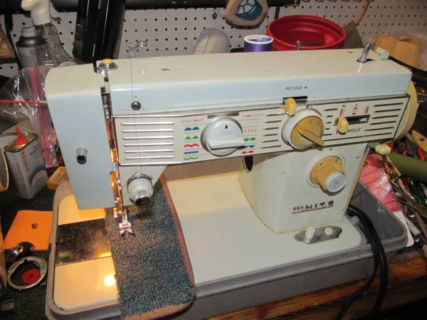 Photo Industrial Strength White 603 Portable Sewing Machine $135