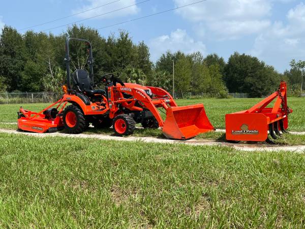 Photo 2019 Kubota BX2380 4x4 loader tractor with attachments $16,000