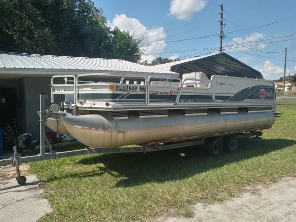 Photo 21ft pontoon hull and trailer, all Aluminum deck. Center console barge $3,500