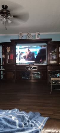 Photo Large r2g entertainment center $1,200