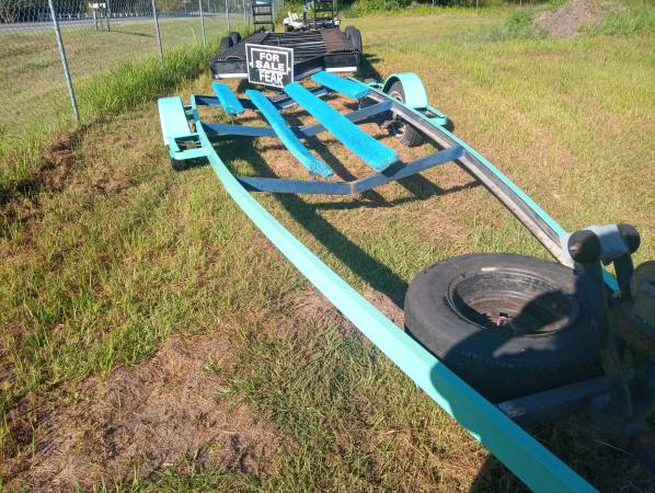 Photo Single or double axle boat double axle tractor $500