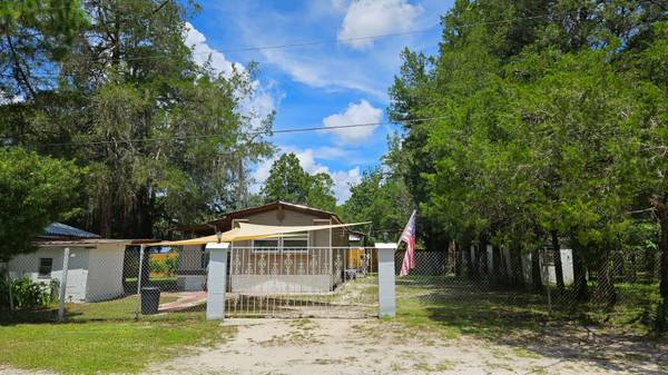 Photo Singlewide mobile home with land and garage $140,000