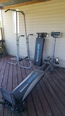 Photo Two Total gym and power tower $200
