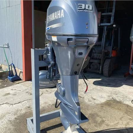 Photo 30hp outboard motor $4,850