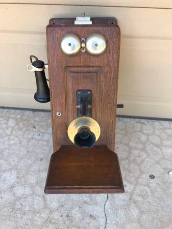 Photo Old wooden wall telephone $100