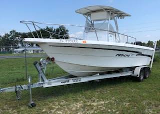 Photo Proline Boat, Motor, and Trailer $22,000