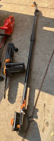 Photo chainsaw, pole saw, extension pruner, and hedge trimmer $75