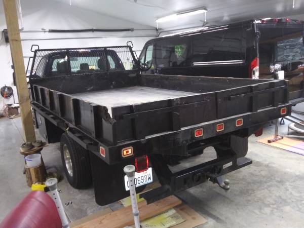 Photo 2014 Ford 1 ton Flatbed Dump Truck $49,950