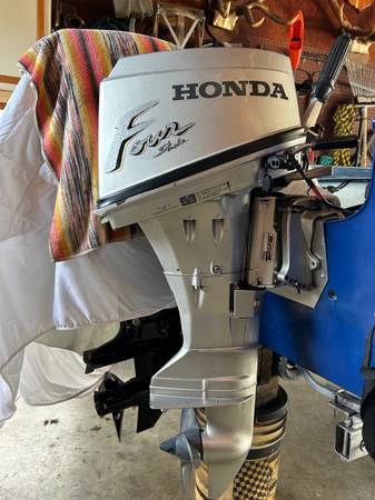 Photo 8 HP outboard motor $800