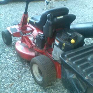 Photo snapper rear engine riding mower $150