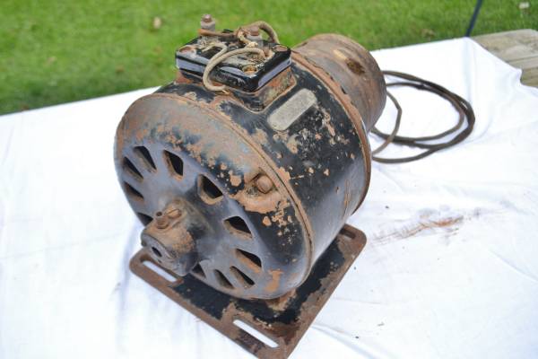Photo Antique Electric Motor, with wood, flat belt pulley and lathe piece. $100